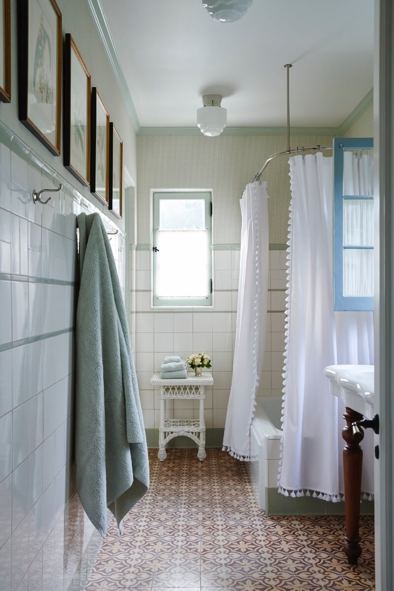 Bathroom view of white and green tile
