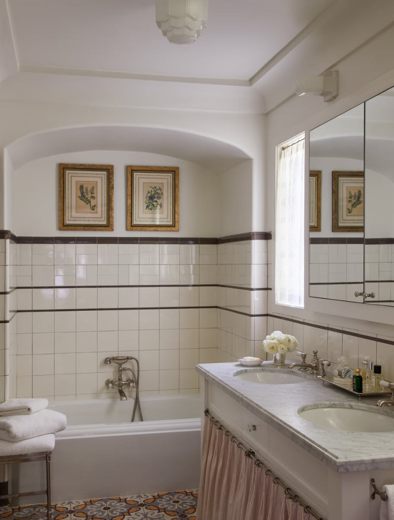 Bathroom view with double sinks and bathroom