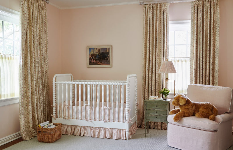 white crib in girls nursery