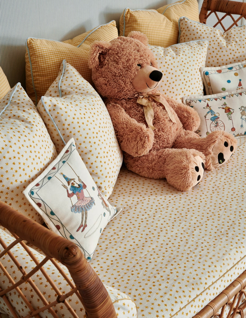 Sofa in nursery with teddy bear