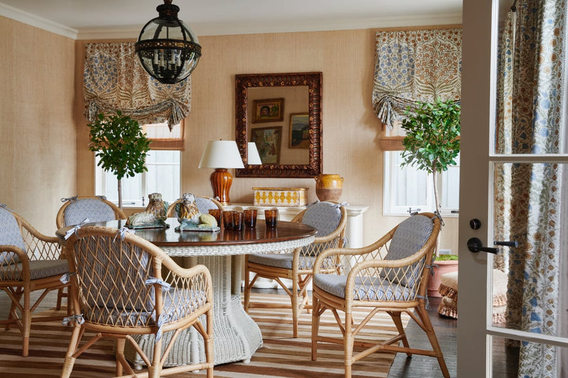 Dining area with cane chairs and woven dining table